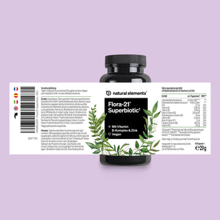 Eine schwarze Flasche "Flora-21 Superbiotic" von natural elements ist vor einem hellvioletten Hintergrund abgebildet, auf dem Produktetikett sind die Inhaltsstoffe und Nährwertangaben aufgeführt.