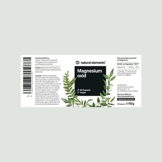 Etikett für das Magnesiumoxid-Nahrungsergänzungsmittel "natural elements", mit grünen Blättern, Produktinformation, Vegan-Symbol und Strichcode.