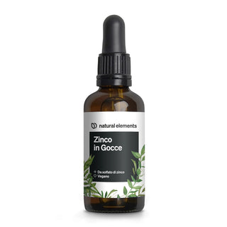 Una bottiglia contagocce di vetro marrone con l'etichetta "Zinco in Gocce" di Natural Elements, con grafica a foglia verde e tappo contagocce nero.
