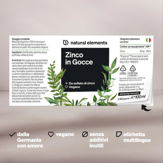 Etikett für das Nahrungsergänzungsmittel "Zinco in Gocce" mit Inhaltsstoffen, Zertifizierungen, mehrsprachigen Informationen und Symbolen für vegane und zusatzstofffreie Produkte.